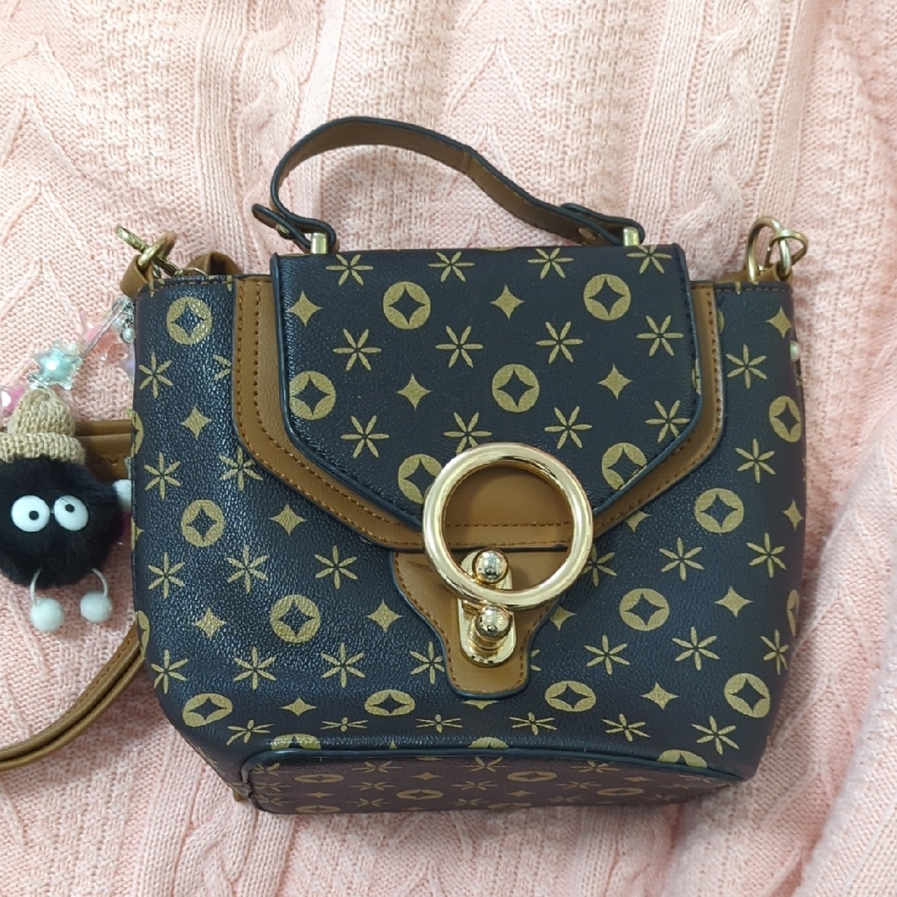 Stylish Black and Gold Handbag
